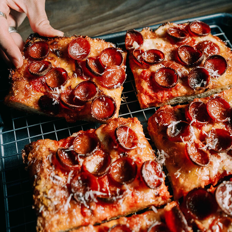 grab a delicious hot square pan pizza and crispy chicken
